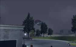 Shortly after exiting the villa compound, Claude sees Catalina fly by the villa in a white helicopter.