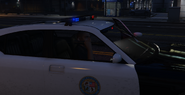 An LSPD officer using the cutscene flashlight model.