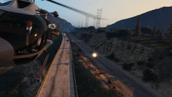 Avery fires an RPG as the team attempts to shoot his helicopter down.