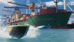 The  loaded with containers. Cranes can also be loading and unloading the ship