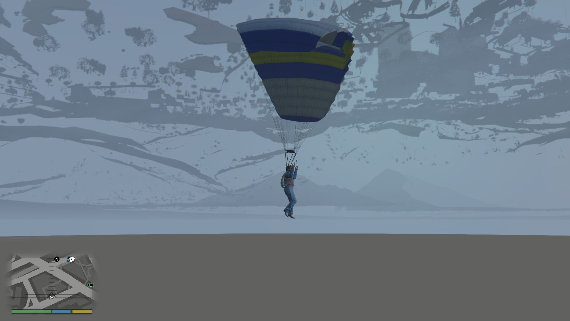 how do you land a parachute in gta v without slamming into the ground?