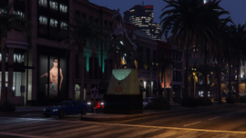 The Faswan statue at night.
