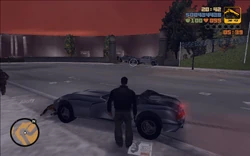 After driving further, Claude comes across a Colombian Cartel checkpoint blocking the entrance to the dam.