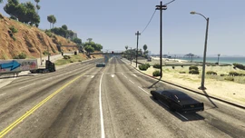 The scripted Surfer crossing the road.