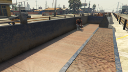 Franklin Clinton taking cover in an empty wellcar.
