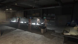 Staff working at the tables.