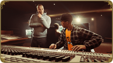 Dr. Dre and DJ Pooh in the studio.