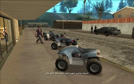 Their leader calls for them to get back on the quads.