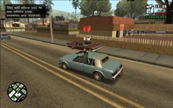 The gang performing a drive-by on some Ballas.