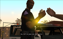 CJ tells the officer that he can't just take his money like that.