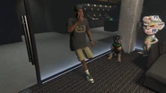 LamarDavis-GTAOe-AgencyIdle.png (2.22 MB) Lamar smoking with Chop in the Agency Operations lounge room.