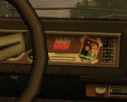 Rhapsody-TLAD-InteriorDashboard.jpg (101 KB) Close-up of the Wayne's World easter-egg in the dashboard.