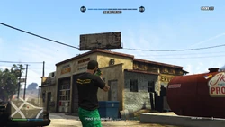 TheCluckinBellFarmRaid-GTAOee-HitAndRun-LocationA-SS5.jpg (537 KB) Shoot the fuse box to open the garage door.