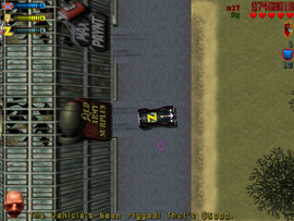 Rigging a vehicle with explosives.