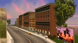 The row of buildings in which Reverend Flannery's is located in Grand Theft Auto: Liberty City Stories.