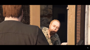 Lester opens the factory door.