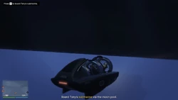 Entering the submarine through the moon pool.