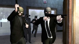 Niko, Packie, Derrick, and Michael enter the bank.