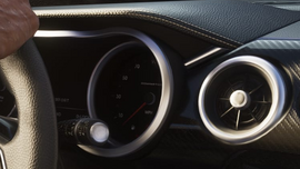 The speedometer of the vehicle, featuring the word "Dominator".