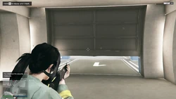 The doors leading to the loading bay tunnel are opened