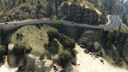 Route1-GTAV-Curve.jpg (81 KB) A curve along Route 1 showing the cliffs and one of the tight corners.