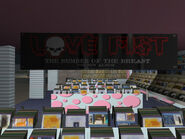 Love Fist's The Number Of The Breast Poster in Vinyl Countdown, North Point Mall.