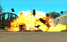 The badly damaged vehicles crash into the roadblock and destroy it.