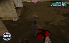 Tommy, about to pick up the briefcase.