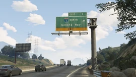 Exit sign to Senora Way.