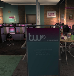 TW@ interior signage in Grand Theft Auto IV.
