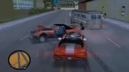 Claude in a Banshee chasing a paparazzo in a Stallion in Grand Theft Auto III.