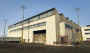 LSIA-GTAO-VehicleWarehouseExterior.png