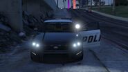 Spotlight turned on the Police Cruiser.