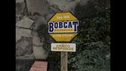 The Bobcat Security sign in front of Franklin's house.