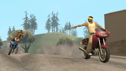 Freddy-GTASA-Shooting.png (1.78 MB) CJ and OG Loc chasing Freddy through Mulholland Intersection.