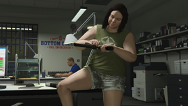 Jenette cleaning a Heavy Revolver.