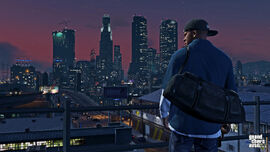 Franklin overlooking Downtown Los Santos with the night-lit Maze Bank Tower in view (PC)