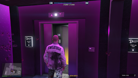 Enter the elevator to the Music Locker.