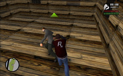 Carl beating the target to death.