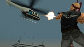 A biker shooting at the helicopter.