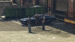 Johnny Guns first seen in person at the railyard with two of his hired gunmen