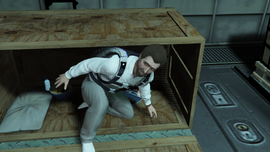 Friedlander hidden in a crate inside his Cargo Plane.