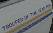 'TROOPER OF THE YEAR 1951' stencil written on the side of their Ranchers.