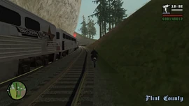 CJ following the train.