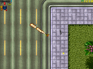 The Player using the flamethrower in Grand Theft Auto.