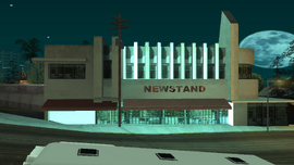 Night view of the building frontage.