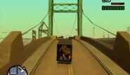 Carl Johnson and Ryder fleeing from the National Guard Depot on the Ocean Docks bridge.