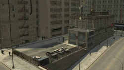 The Middle Park East Police Station rear parking lot as seen from 