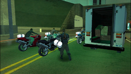 As CJ arrives, he notices the bikers stealing drug packages.