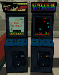 The Degenatron arcade console (on the right).